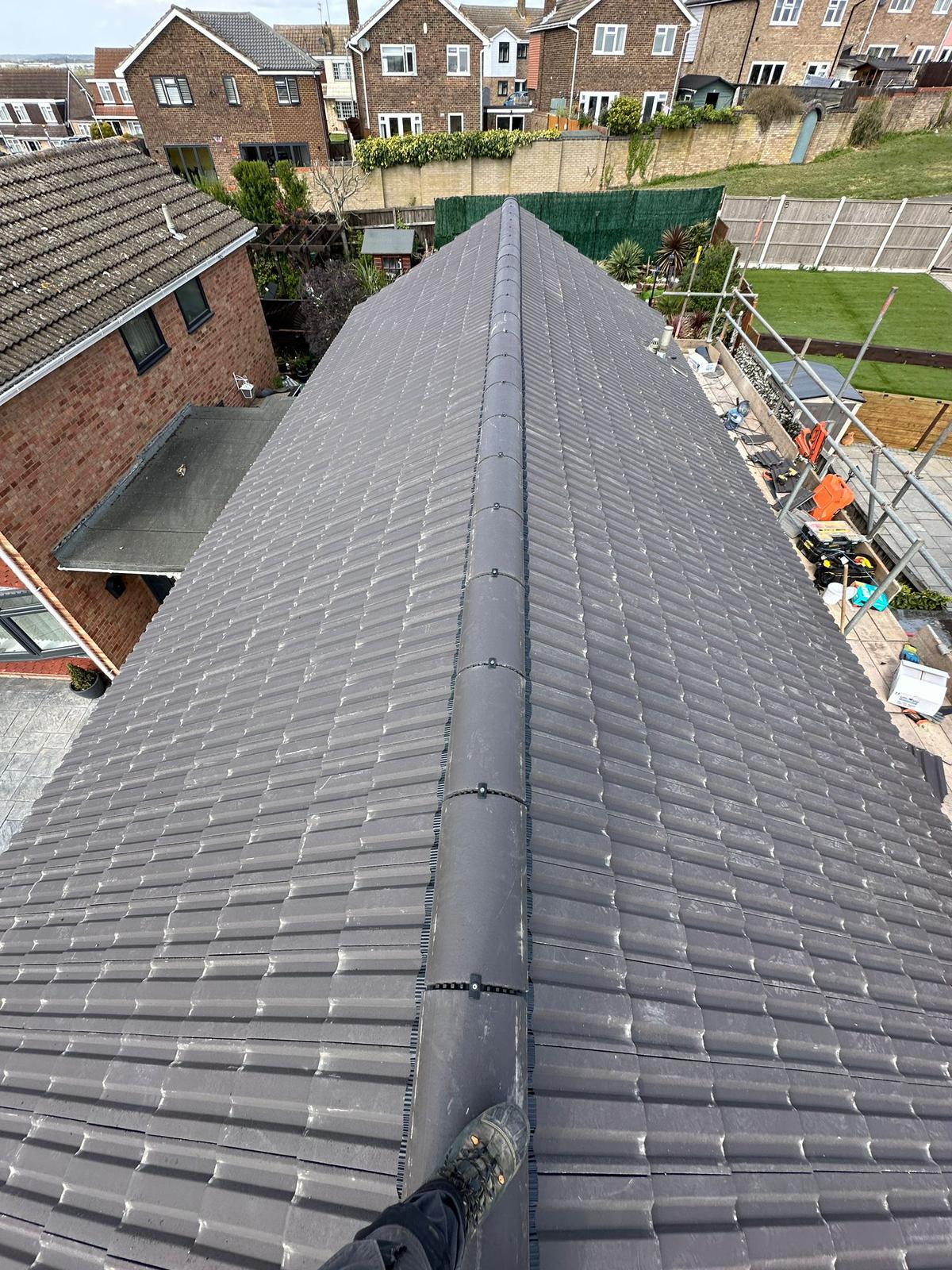 Completed new dark tiled roof